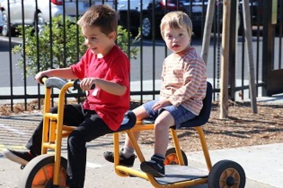 Two children on a bicycle